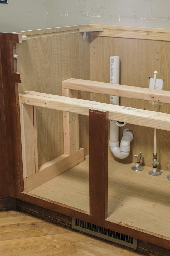 base for farmhouse sink in cabinet