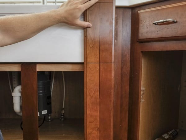 installing cabinet pieces