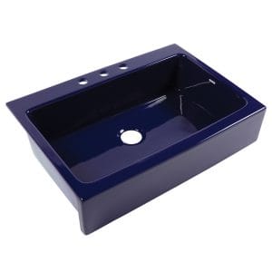 A glossy royal blue rectangular Quick-Fit® drop-in farmhouse sink made in fireclay with 3 faucet holes and a 3.5" drain hole.