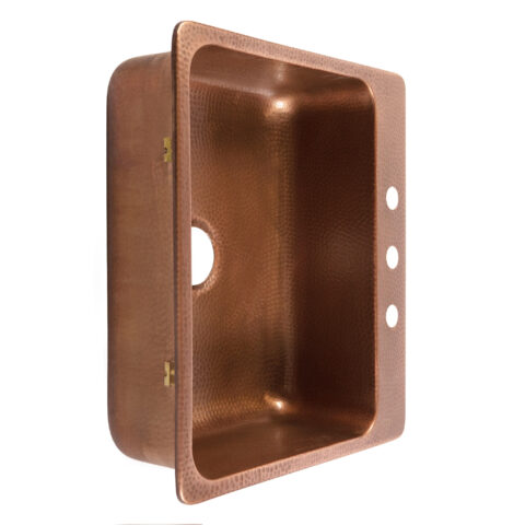A copper rectangular drop-in sink.