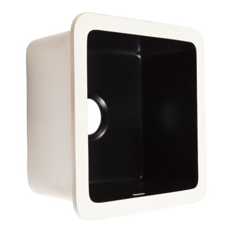 A matte black square undermount bar and prep sink made in fireclay.