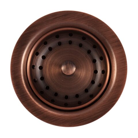 A antique brown kitchen sink strainer drain.