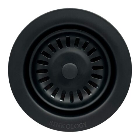 A matte black kitchen sink disposal drain.