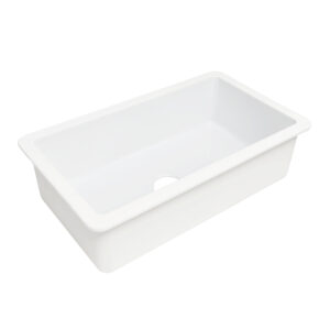 Crisp white fireclay undermount kitchen sink with a 3.5" drain hole